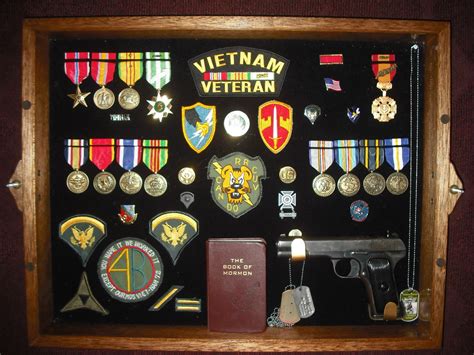 how do you attach metals in a shadow box|military token shadow box.